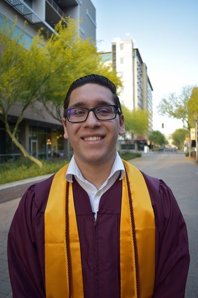  in his graduation gown