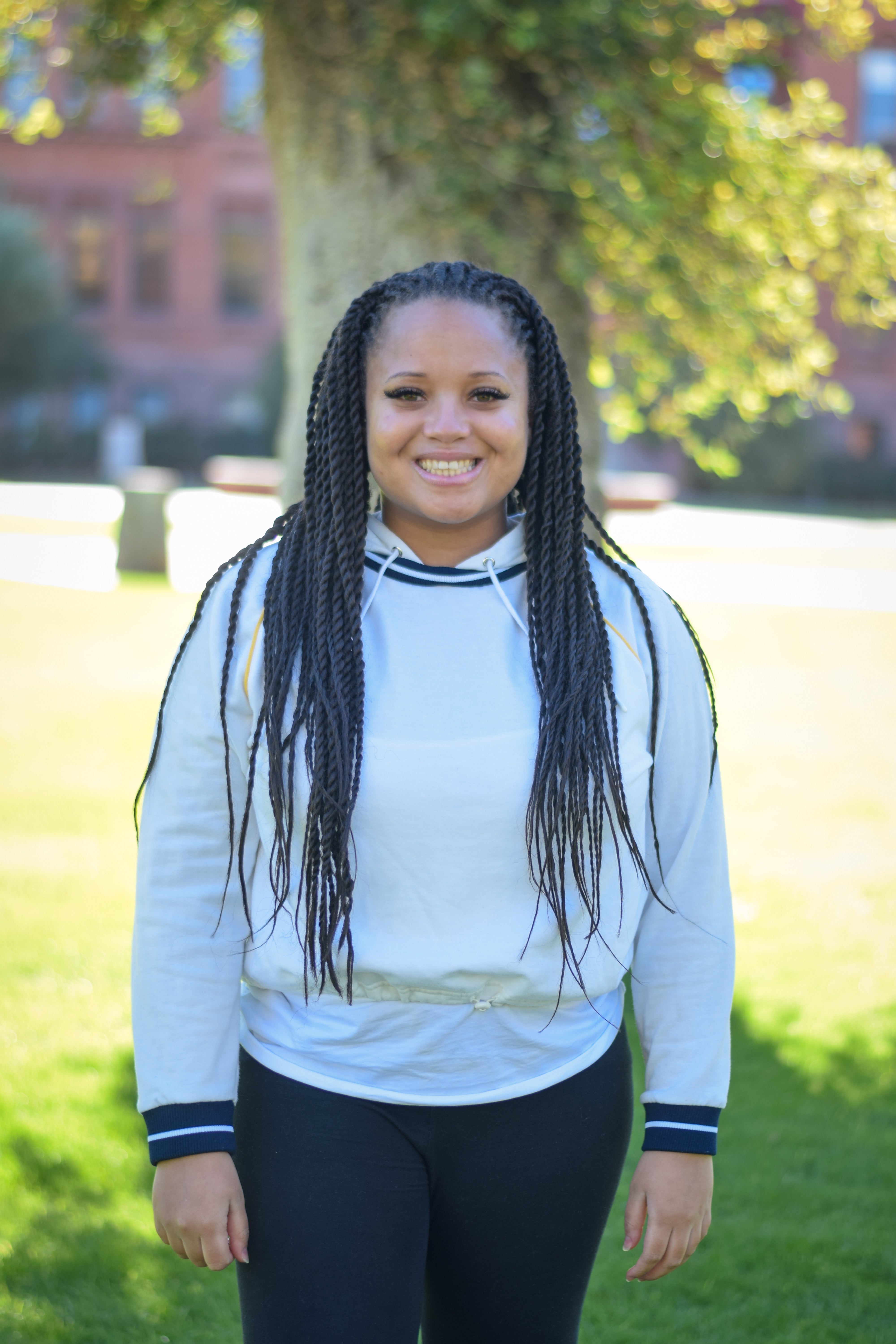 Graduate Ashley Turner stands strong in front of Old Main at Arizona State University.