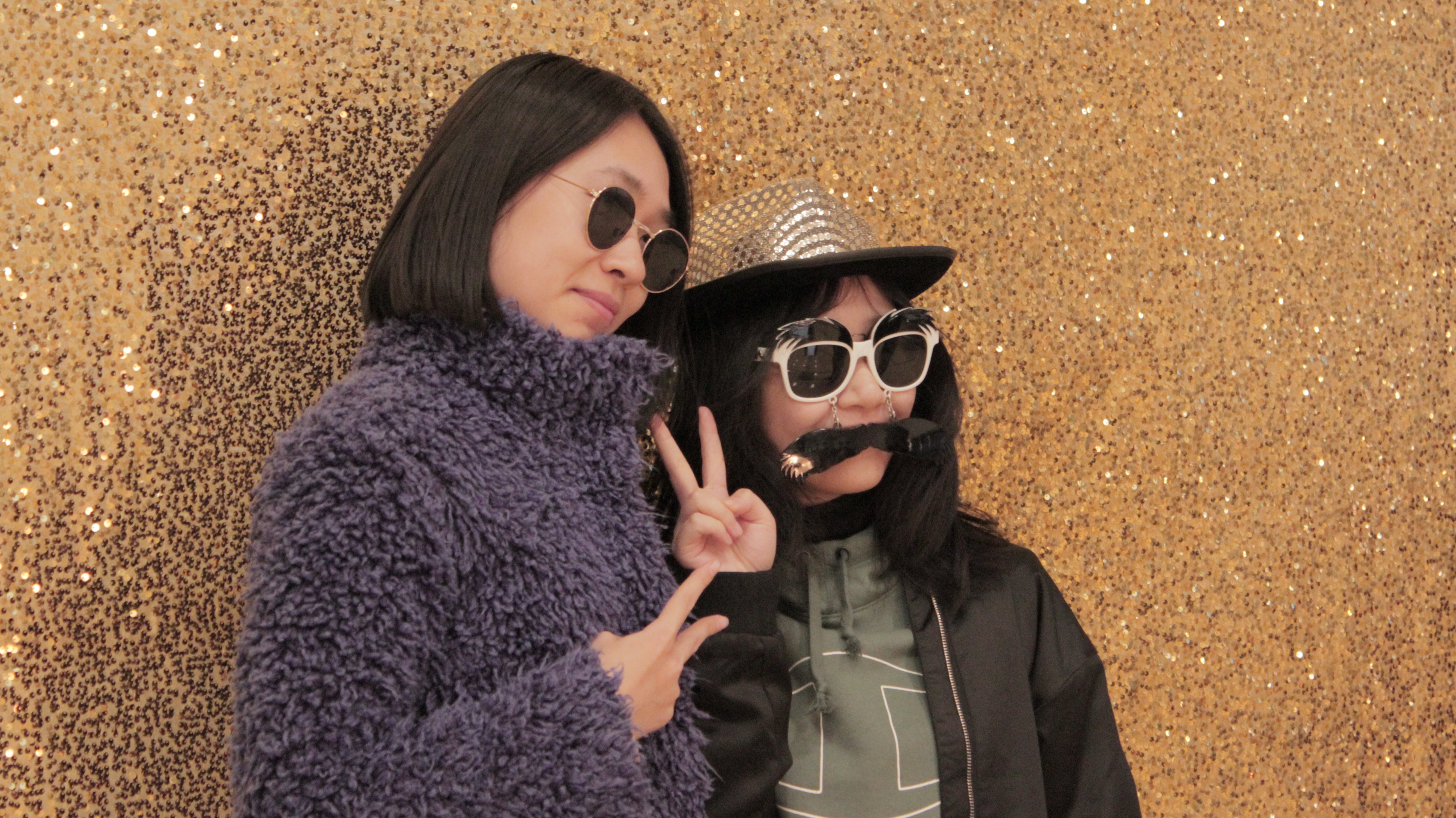 ASU international students pose in a photobooth for the 2019 orientation carnival