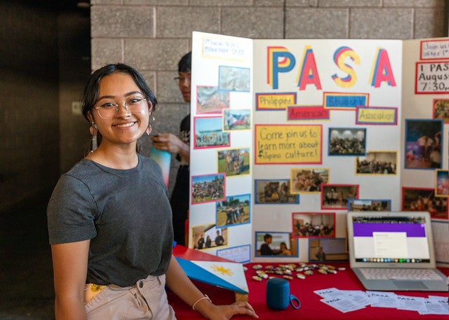 A student in ASU's PASA club tables at CultureFest