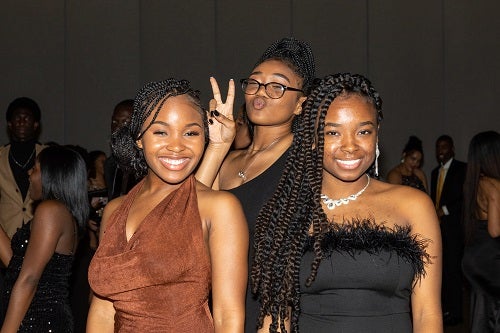 Three students at the Black Excellence Ball at ASU