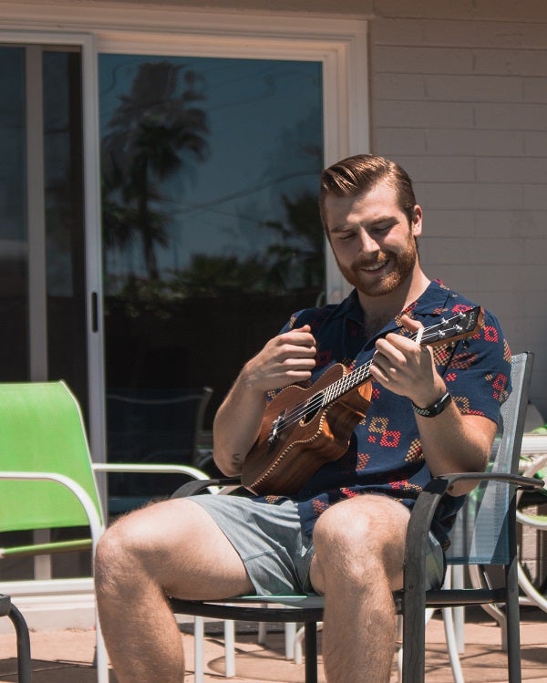 Colton Lish playing a ukelele