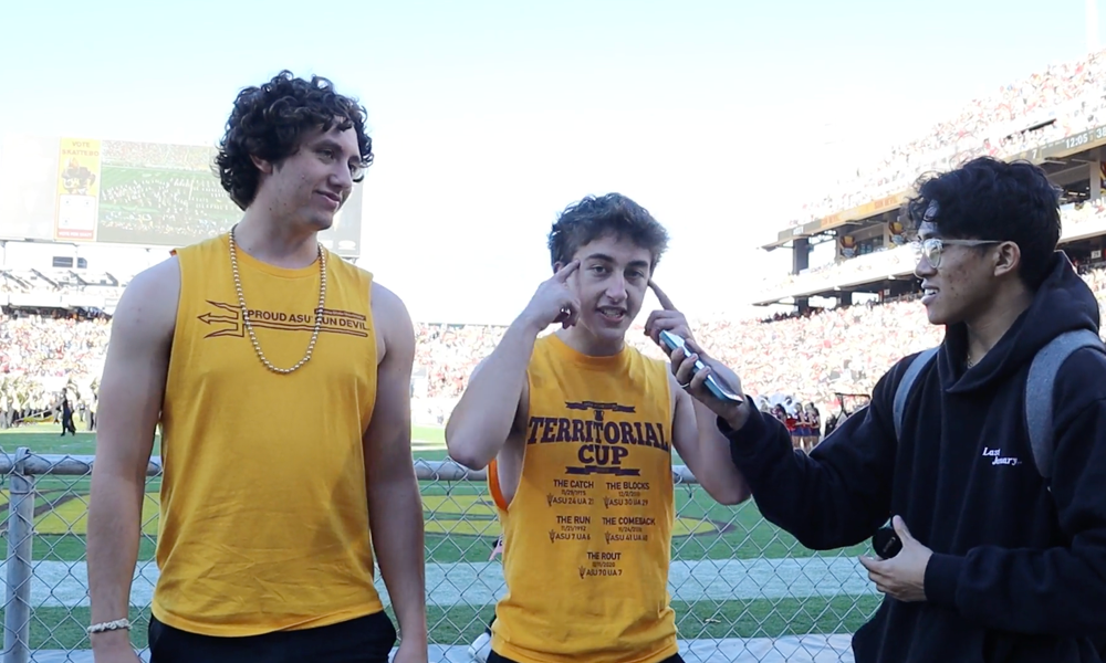 Mason Kasimov (Freshman, Sports Business), Carson Carpenter (Freshman, Political Science) and Reporter Jr De Chavez | Kasimov and Carpenter photographed while attending last year’s Territorial Cup in November of 2023. | Photo courtesy of Ashish Rajapuram