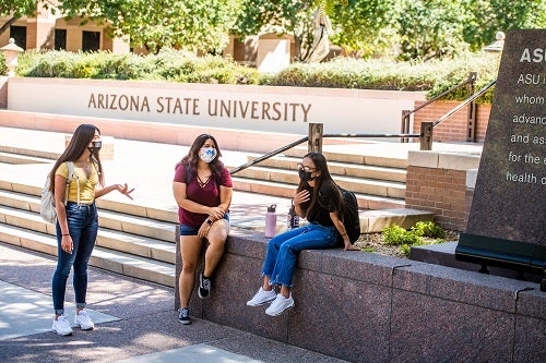 ASU students talking outside in masks